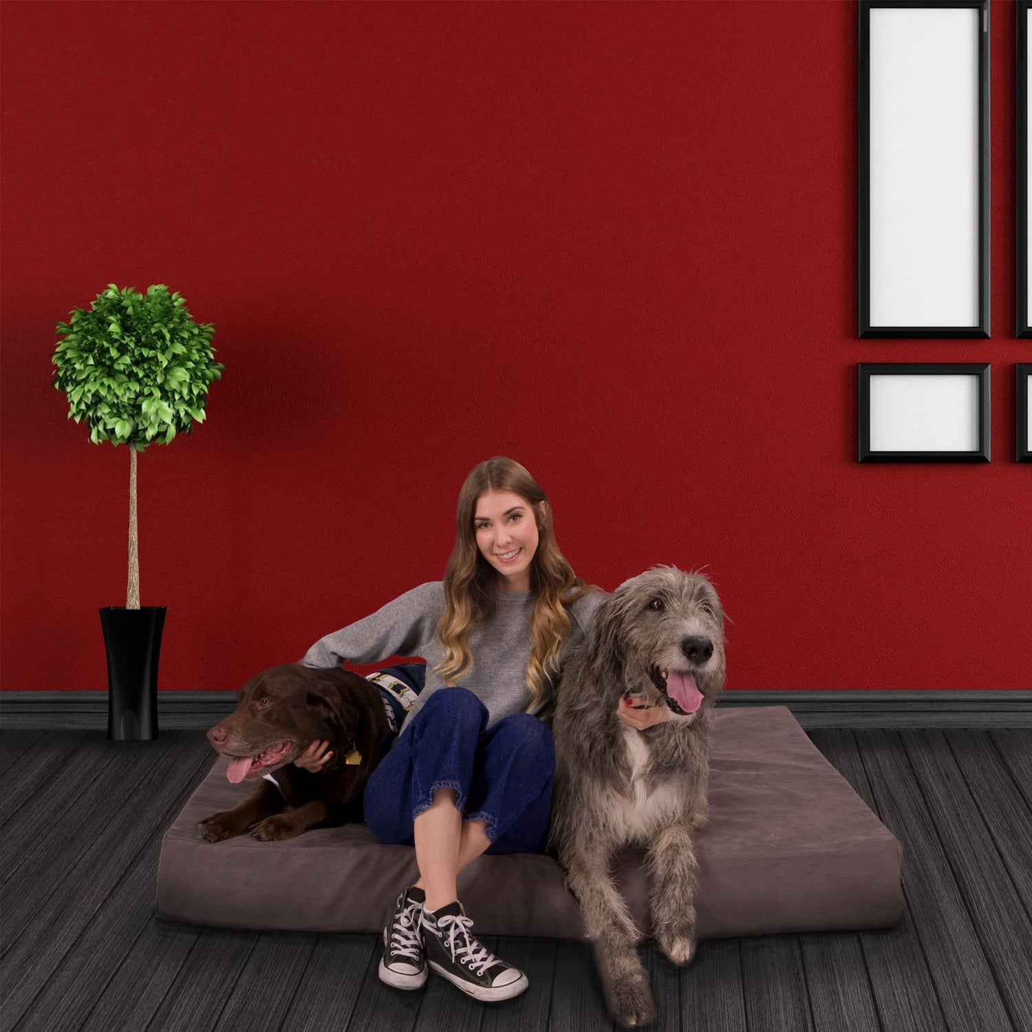 A woman smiles while sitting on the Big Dog Orthopedic 7